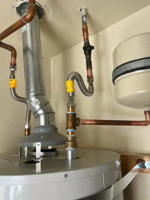 Water heater installation and plumbing repair in Mountain Woods